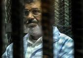 وصول مرسي وآخرين لأكاديمية الشرطة استعدادا لبدء محاكمتهم في 