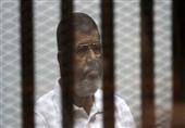 وصول مرسي وآخرين لأكاديمية الشرطة استعدادا لبدء محاكمتهم في قضية 