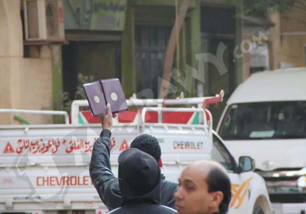 2014 11 28 10 9 33 561 مظاهرات 28 نوفمبر : صور رفع المصاحف واشارات رابعة من المتظاهرين