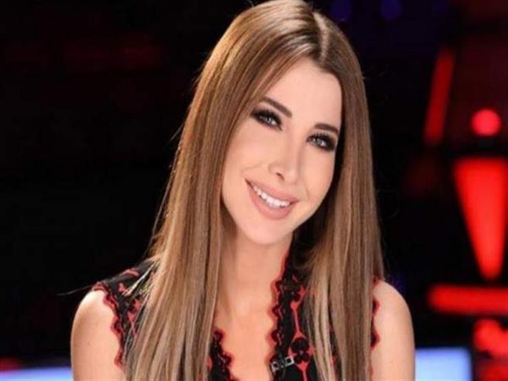 بالصور - في حملها الثالث نانسي عجرم بفستان جذاب يظهر انوثتها