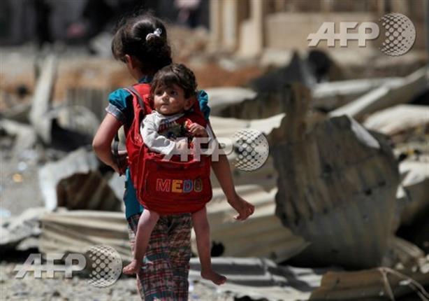 صورة وخبر: الموصل.. طفلة في حقيبة ورحلة نزوح صورة وخبر: الموصل.. طفلة في حقيبة ورحلة نزوح
