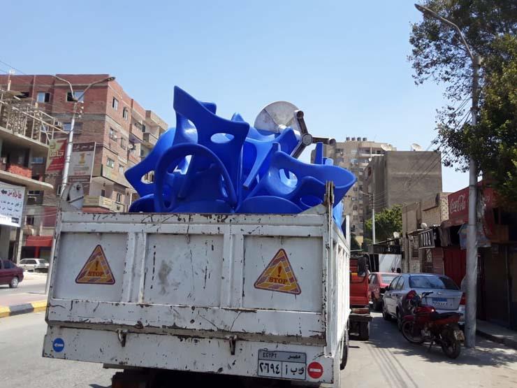 شرطة المرافق تتصدى لإشغالات شارع التحرير في الدقي شرطة المرافق تتصدى لإشغالات شارع التحرير في الدقي