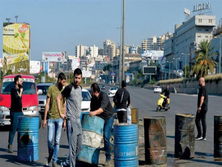 محتجون يقطعون عددا من الطرق شمال لبنان بسبب الأوضاع الاقتصادية محتجون يقطعون عددا من الطرق شمال لبنان بسبب الأوضاع الاقتصادية